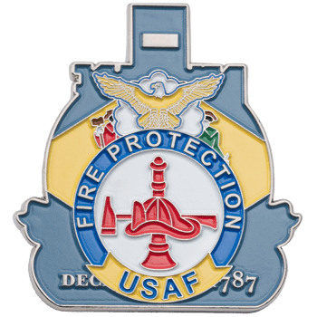 Shield-shaped coin with 'Fire Protection' and 'USAF' text, featuring a red hydrant, helmet, and axe icon below a golden eagle.