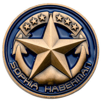 Antique bronze challenge coin featuring a large central star, anchors, and six small stars on a blue enamel background with the name Sophia Haberman.