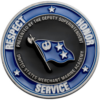 Circular challenge coin featuring a blue flag with anchor and stars, surrounded by blue and black enamel with academy text and values.