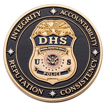 Gold and black challenge coin featuring the DHS Federal Protective Service Police badge with core values integrity, accountability, consistency, and reputation.