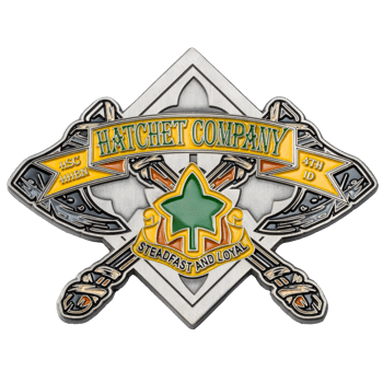 Custom die-cut enamel challenge coin for Hatchet Company featuring crossed axes, a green leaf emblem, and the motto Steadfast and Loyal.