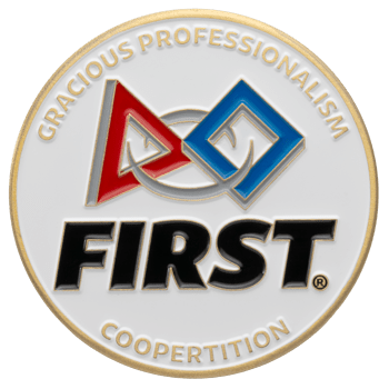 Circular challenge coin with FIRST logo, red triangle, blue diamond, and text Gracious Professionalism and Coopertition.