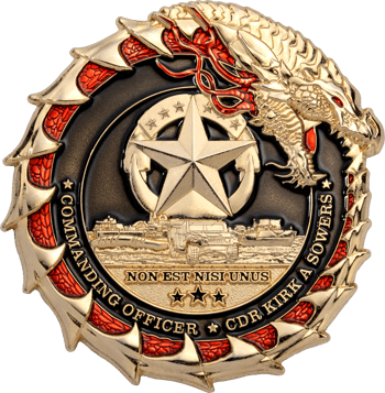 Custom challenge coin featuring a golden dragon wrapped around a central star emblem, military vehicles, and text for Commanding Officer CDR Kirk A Sowers.
