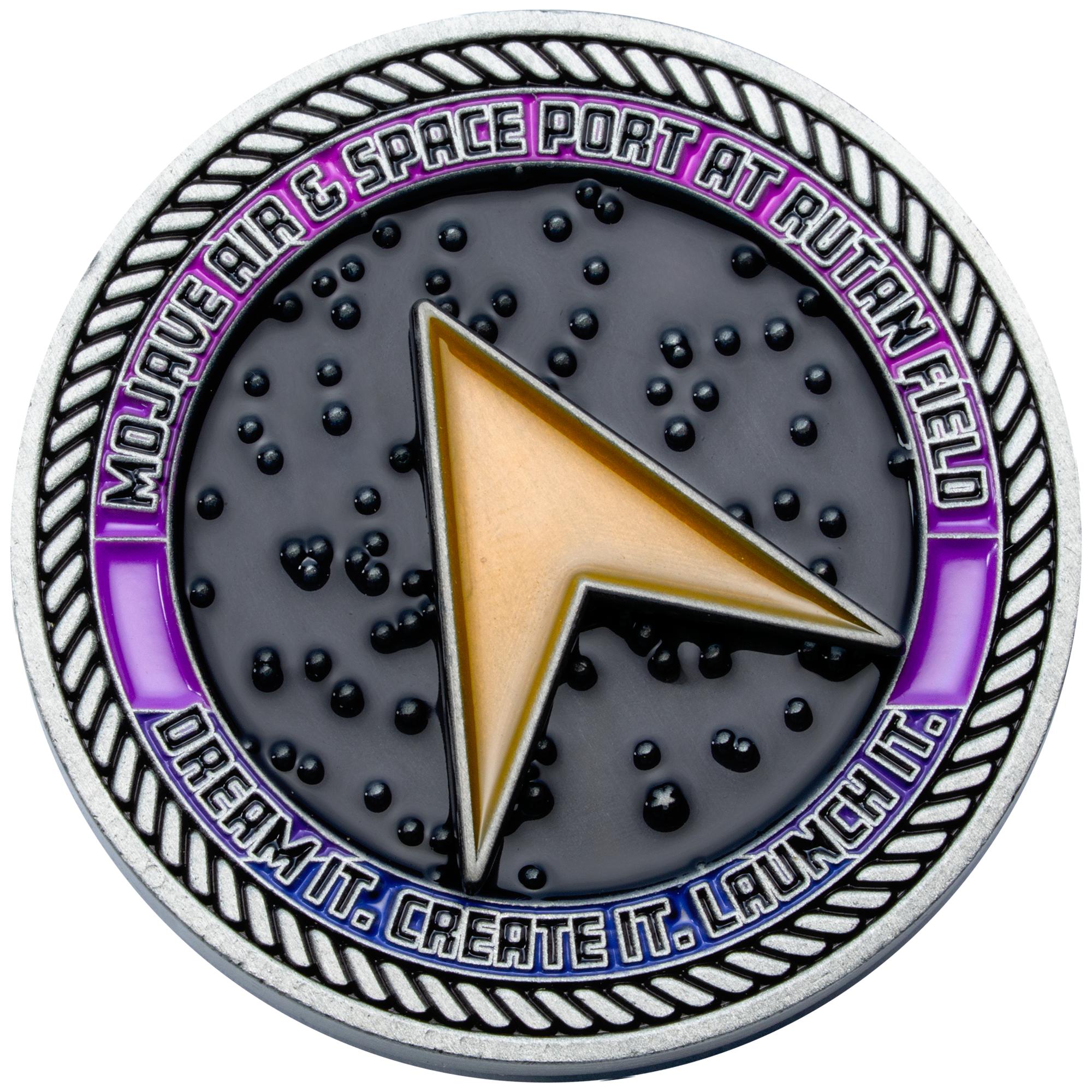 Round challenge coin for Mojave Air & Space Port at Rutan Field featuring a gold delta symbol against a black starry background and a purple outer ring.