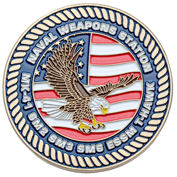 Challenge coin featuring a bald eagle over an American flag background with text for Naval Weapons Station and missile designations.