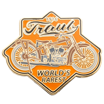 Shield-shaped orange and gold lapel pin featuring a 1916 Traub motorcycle illustration and the text World's Rarest.