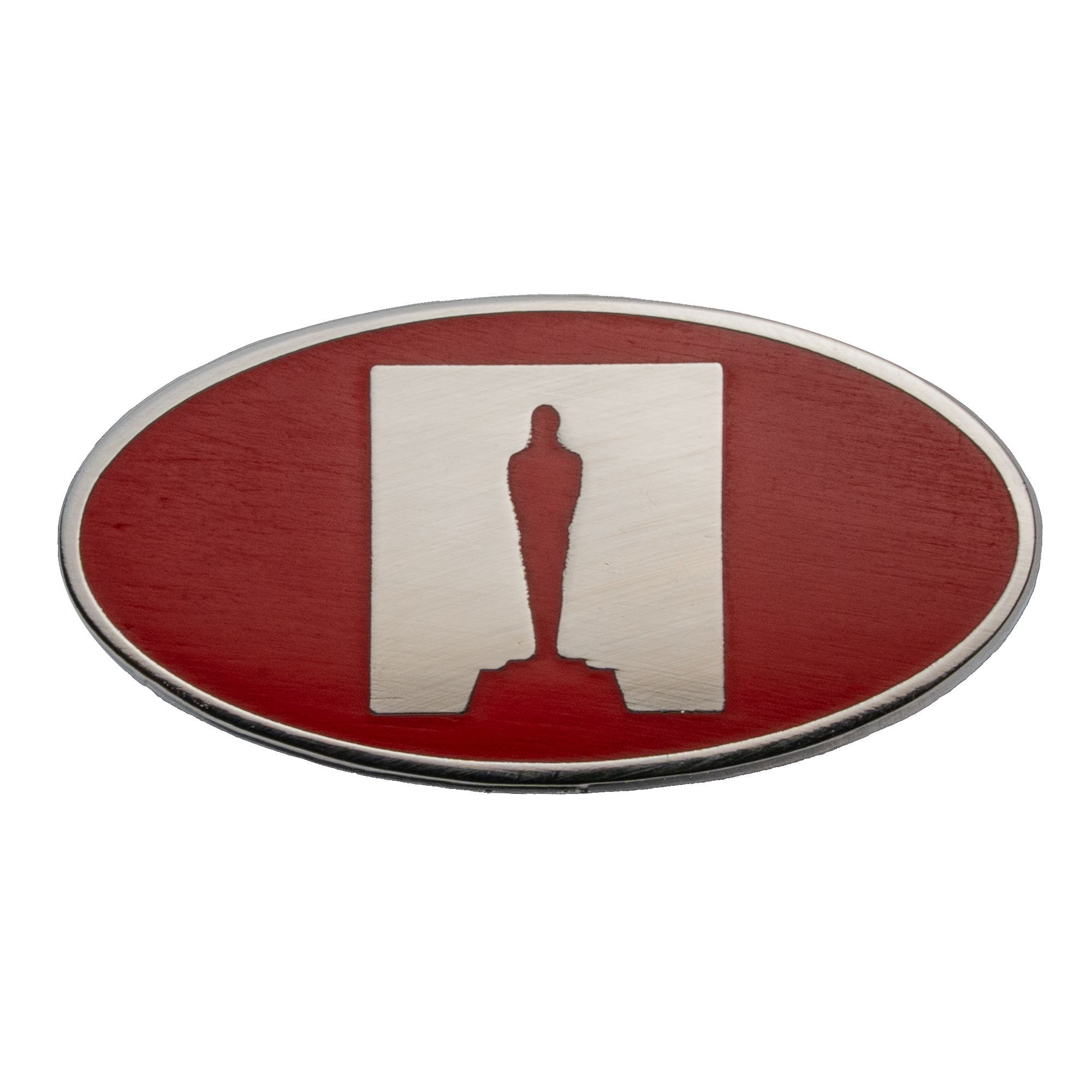 Oval lapel pin featuring a red background with a silver square containing a cut-out silhouette of an Academy Award Oscar statuette.