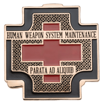 Cross-shaped challenge coin featuring a red cross, black background, and Human Weapon System Maintenance text with Parata Ad Aliquid inscription.