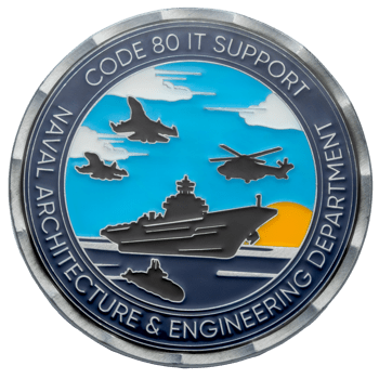 Circular challenge coin featuring Naval Architecture & Engineering Department text with an aircraft carrier, submarine, jets, and helicopter over a blue sea.
