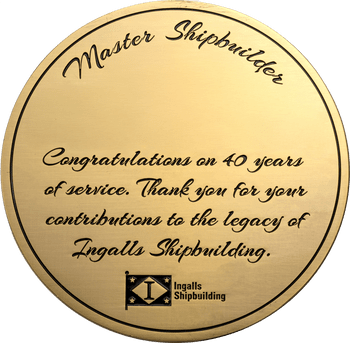Gold challenge coin honoring Master Shipbuilder 40 years of service with Ingalls Shipbuilding logo.