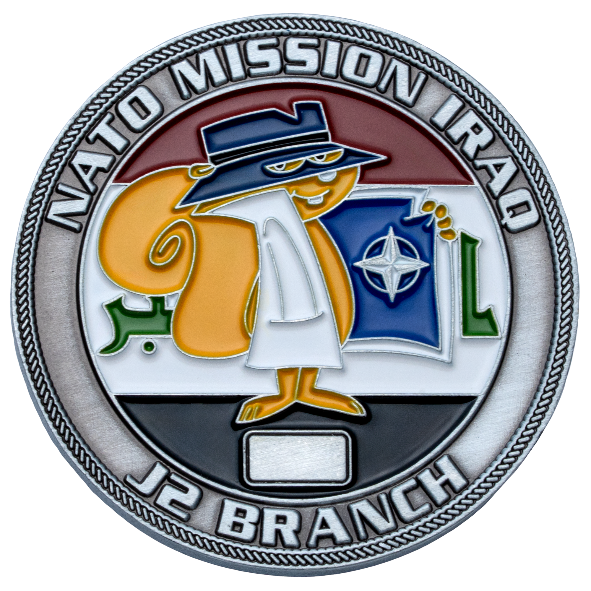 Circular challenge coin featuring a cartoon squirrel in a detective outfit with the NATO logo and the text NATO Mission Iraq J2 Branch.