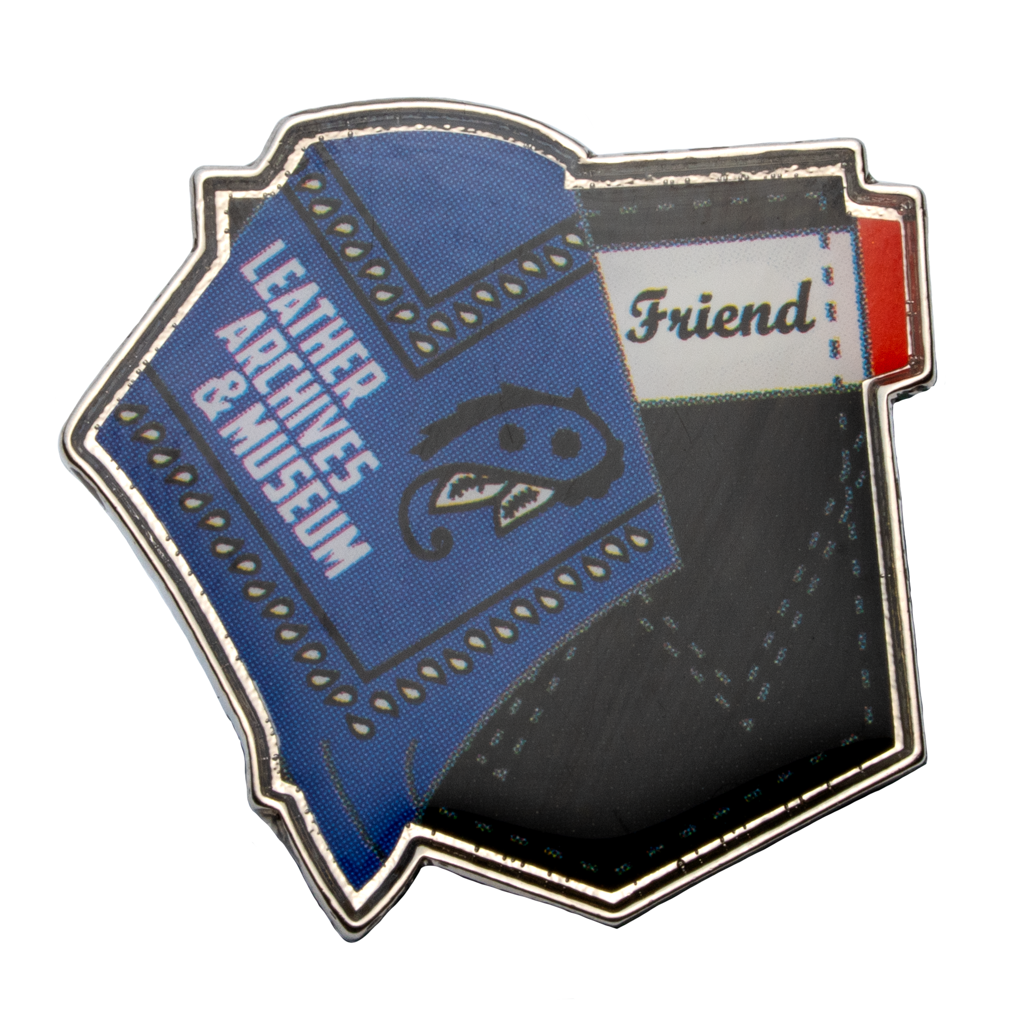 Shield-shaped lapel pin featuring the Leather Archives & Museum logo on a blue paisley pattern with the word Friend on a white banner.