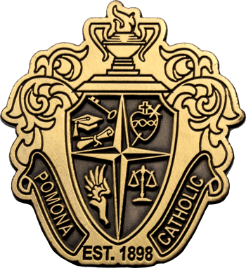 Gold and black lapel pin featuring the Pomona Catholic crest with a lamp of knowledge, graduation cap, sacred heart, and scales of justice.