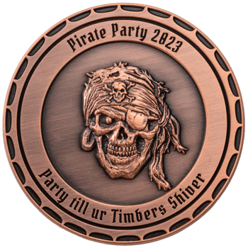 Antiqued copper coin featuring a pirate skull with an eyepatch and bandana, embossed with the text Pirate Party 2023.